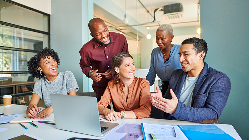 group of inspired creative professionals sharing ideas