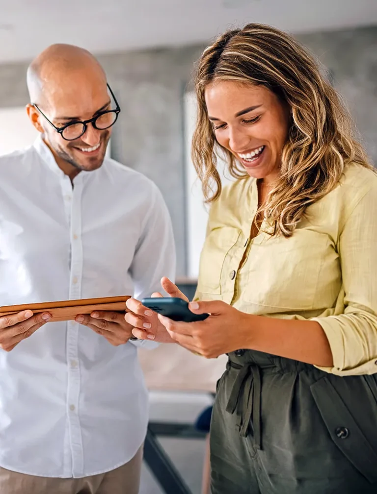 Man and woman comparing their MCode Dimension results