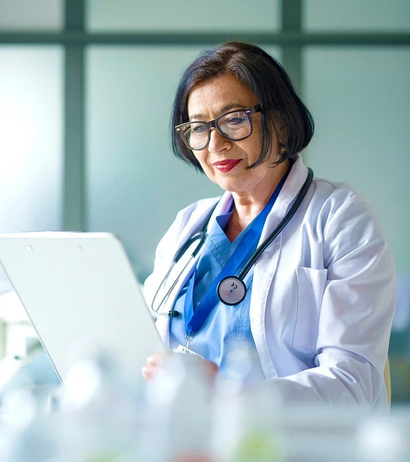 A doctor reviewing candidates for a position