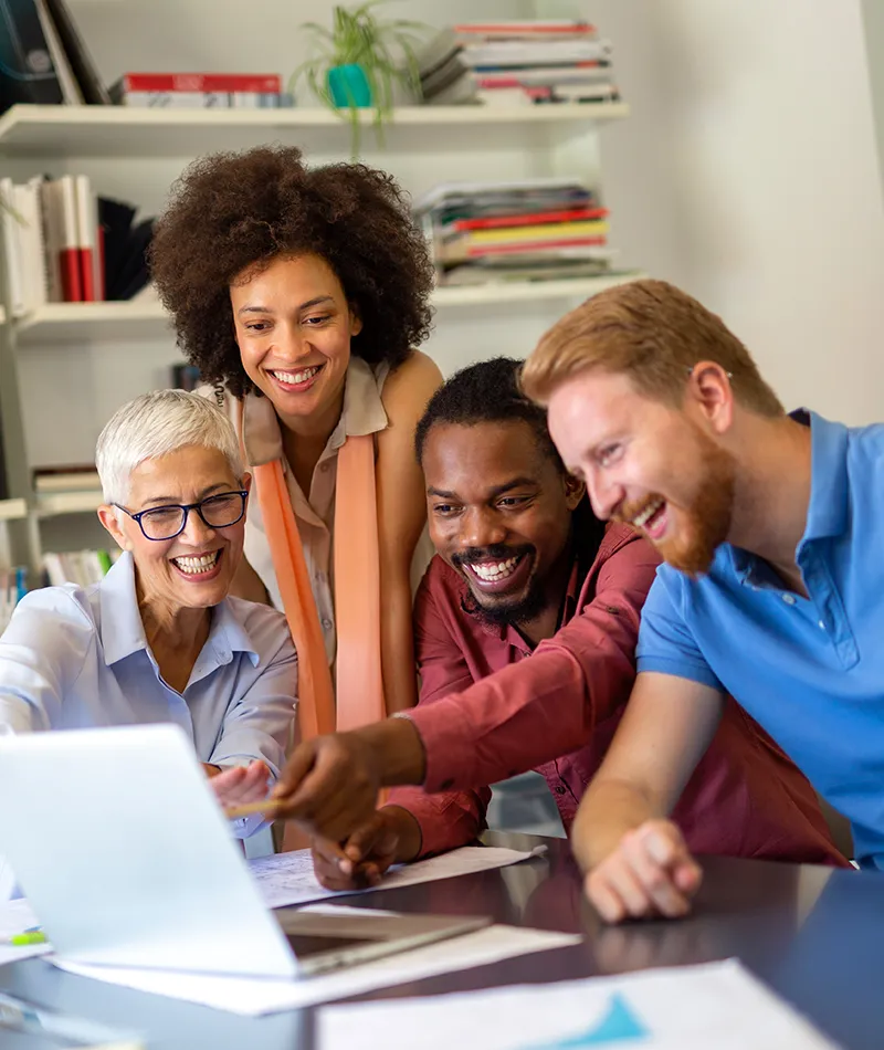 Team reviewing their MCode results with enthusiasm