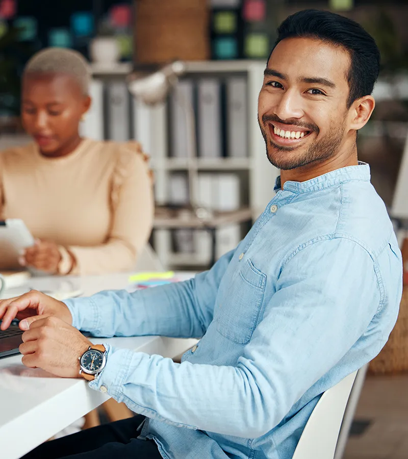 Man smiling while at work